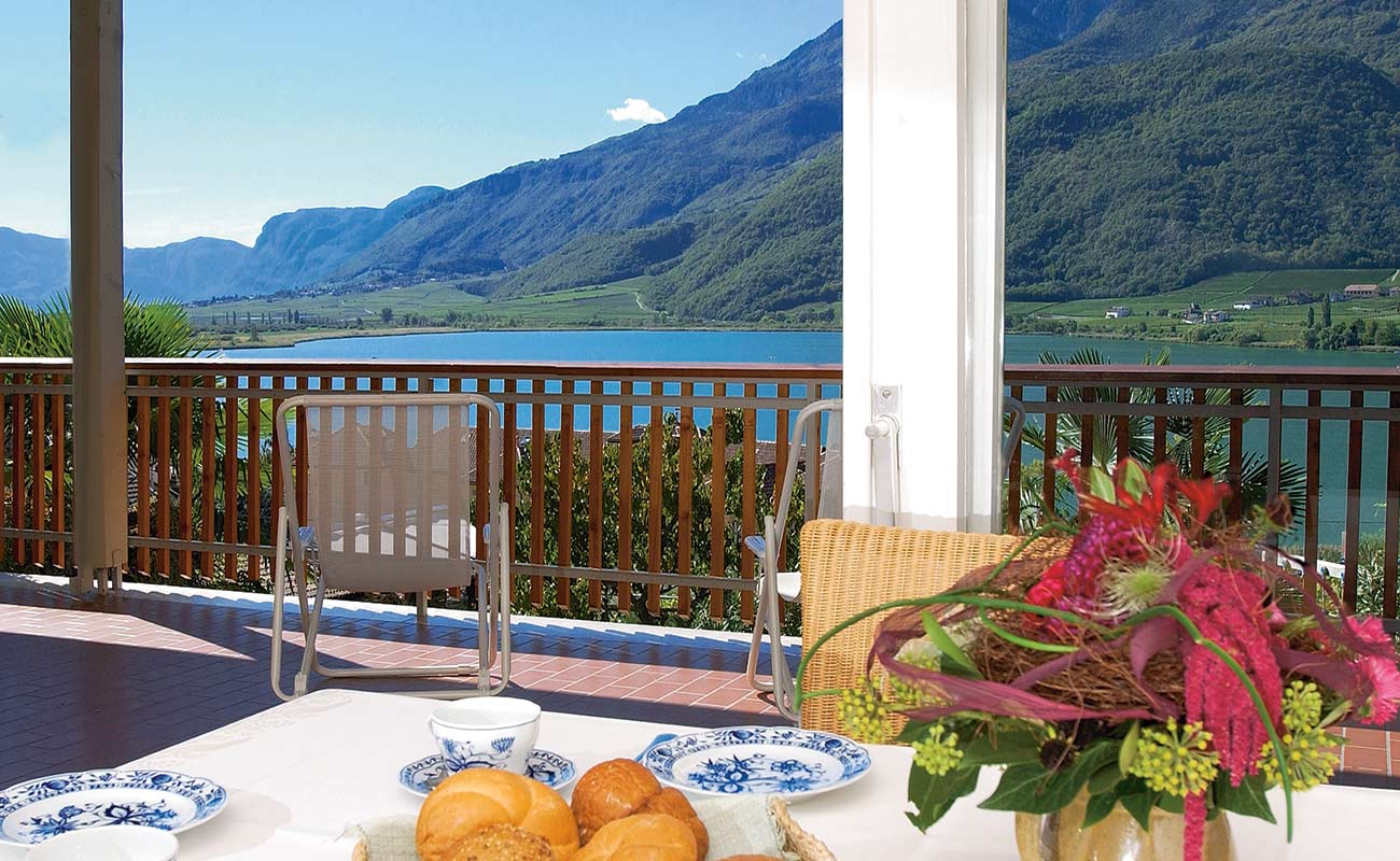 Table set and terrace with lake view